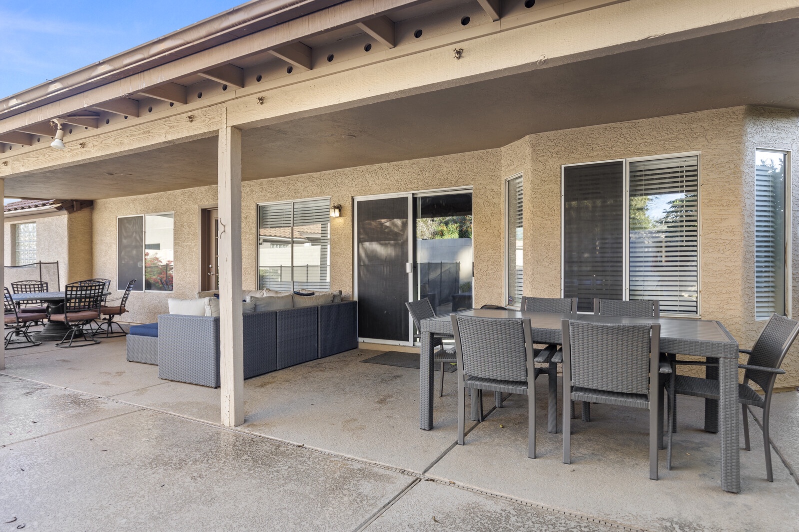 Covered outdoor sitting and dining area