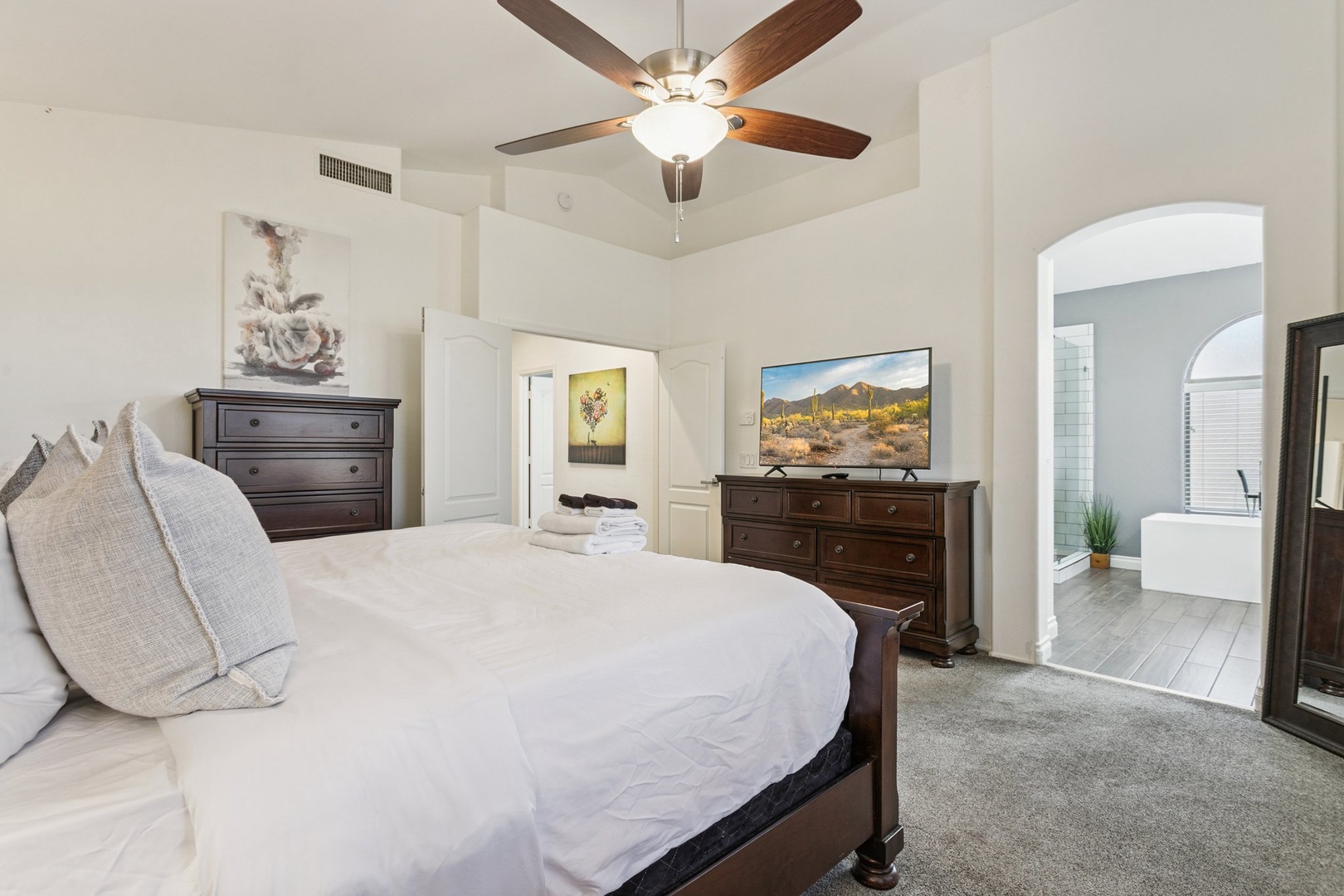 Unwind in this elegant master suite featuring plush bedding and your own private ensuite retreat.