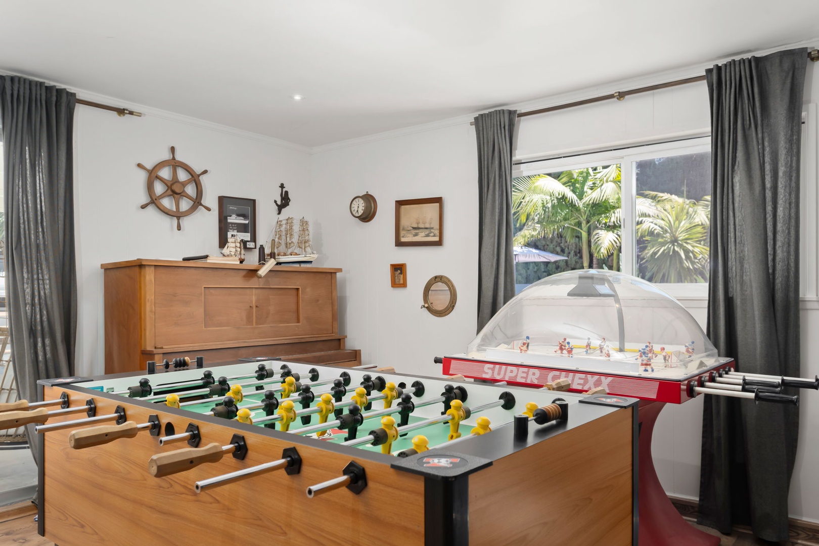 Challenge friends to foosball or dome hockey in the "hidden" game room