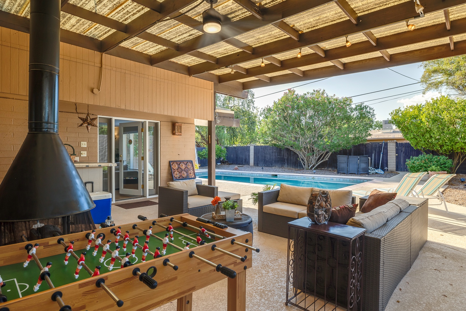 Foosball and covered patio lounge area