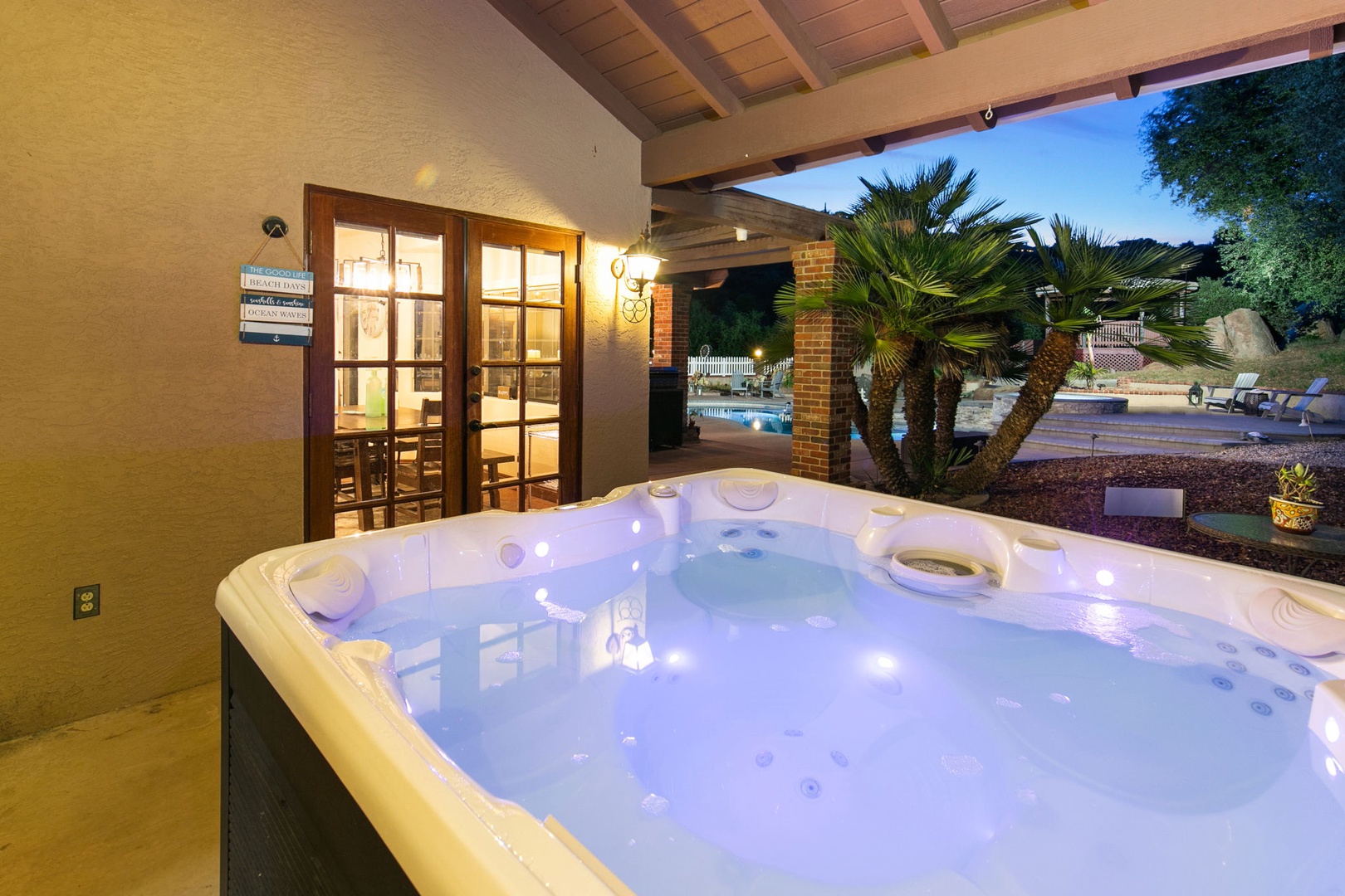 Slip into your private hot tub as evening settles