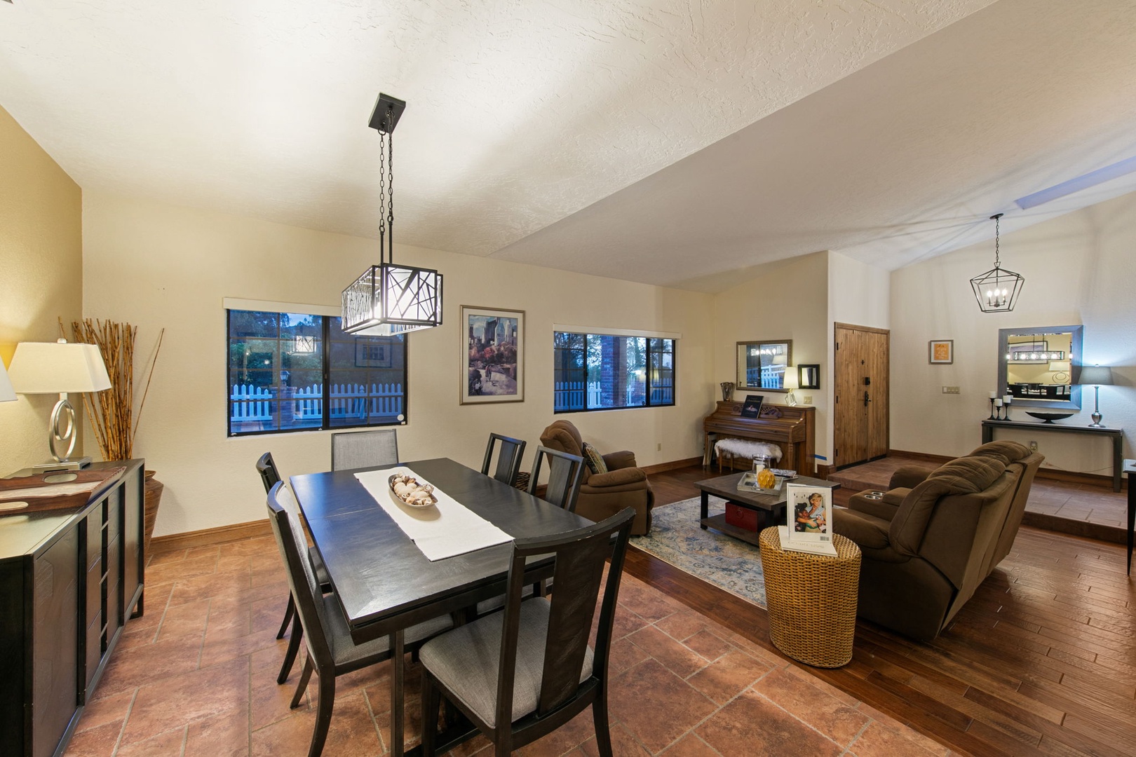 Gather around your spacious dining table for memorable meals, then sink into plush living room seating for cozy evenings together.