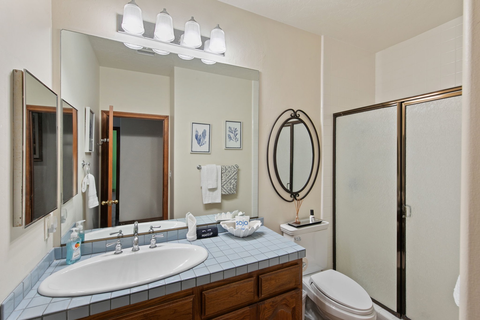 Your private bathroom features thoughtful details and ample space to refresh after your adventures.