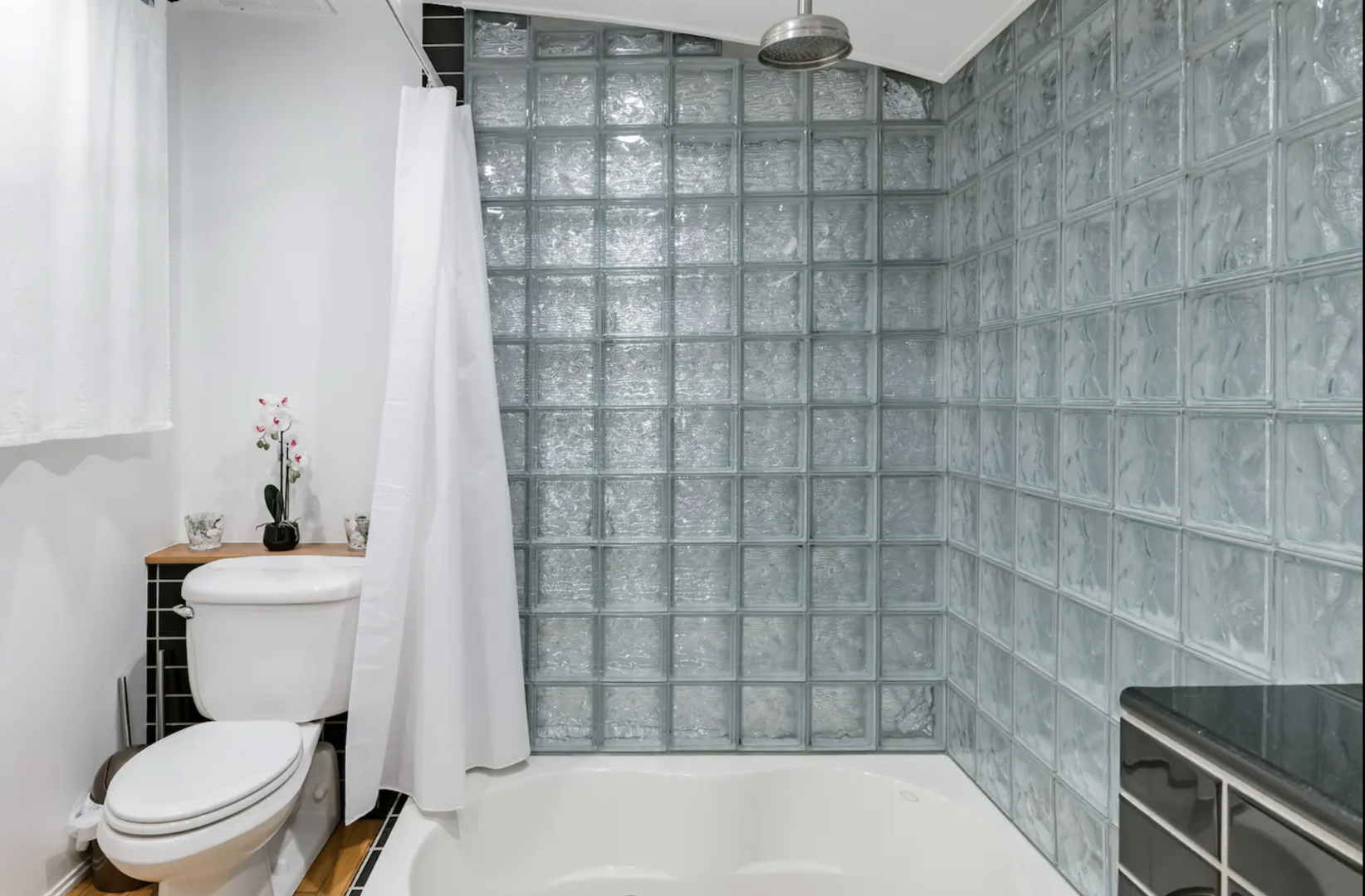 Full bathroom with a soaking tub