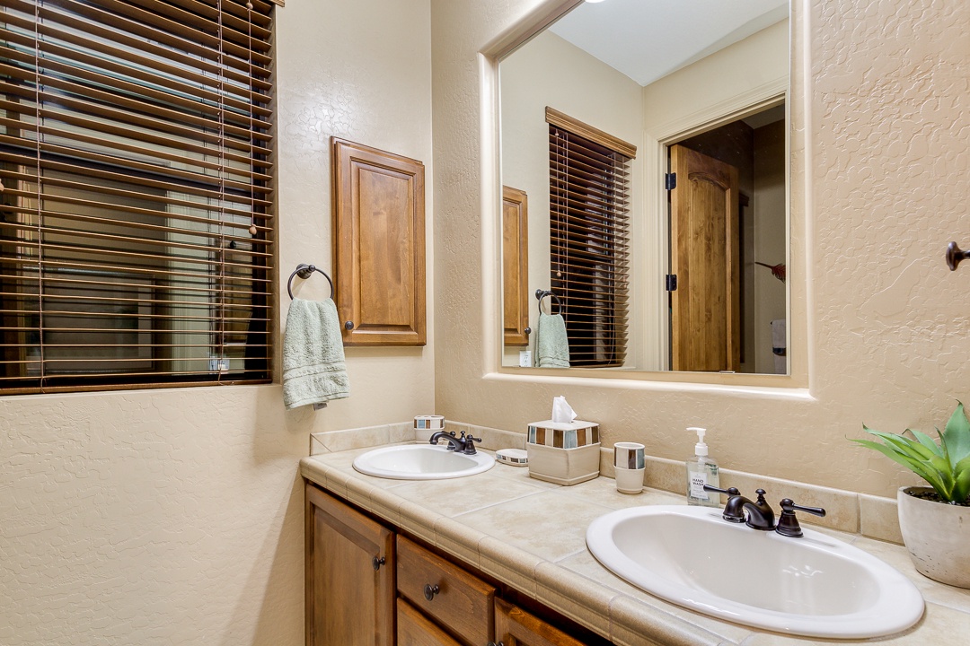 Bathrooms are stocked with items including: shampoo, conditioner, body wash, and fresh towels.