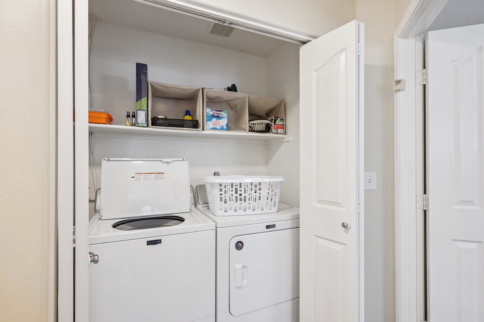Your private laundry room keeps you refreshed with full-size washer and dryer, plus shelving for supplies.