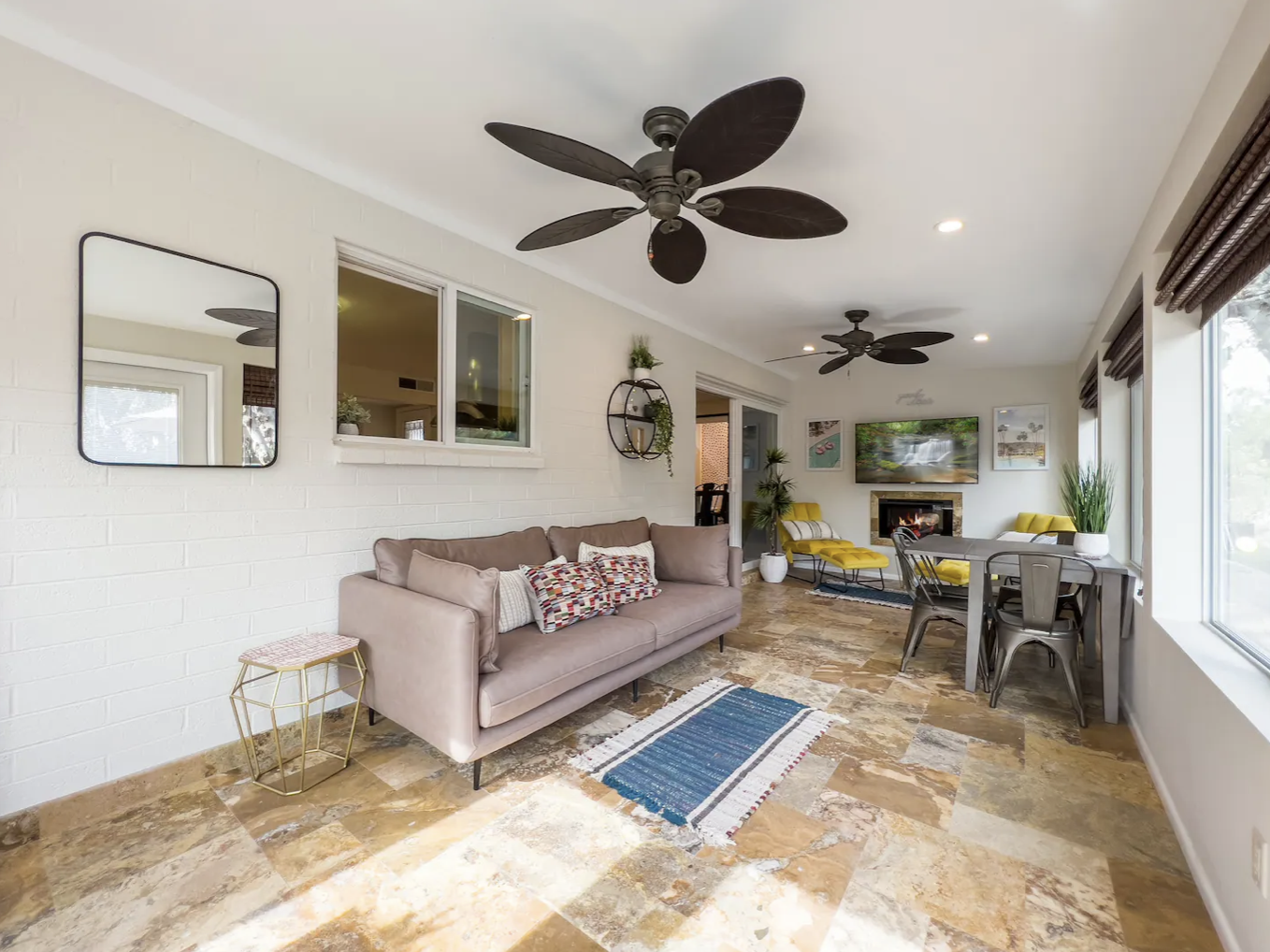 Additional seating room with views of the backyard and pool.