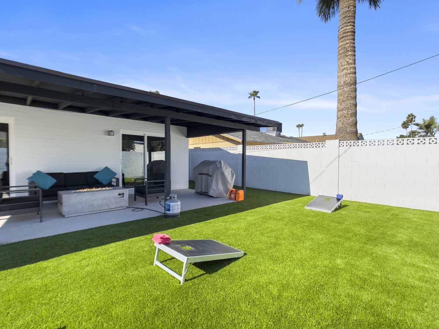 Spacious backyard with yard games
