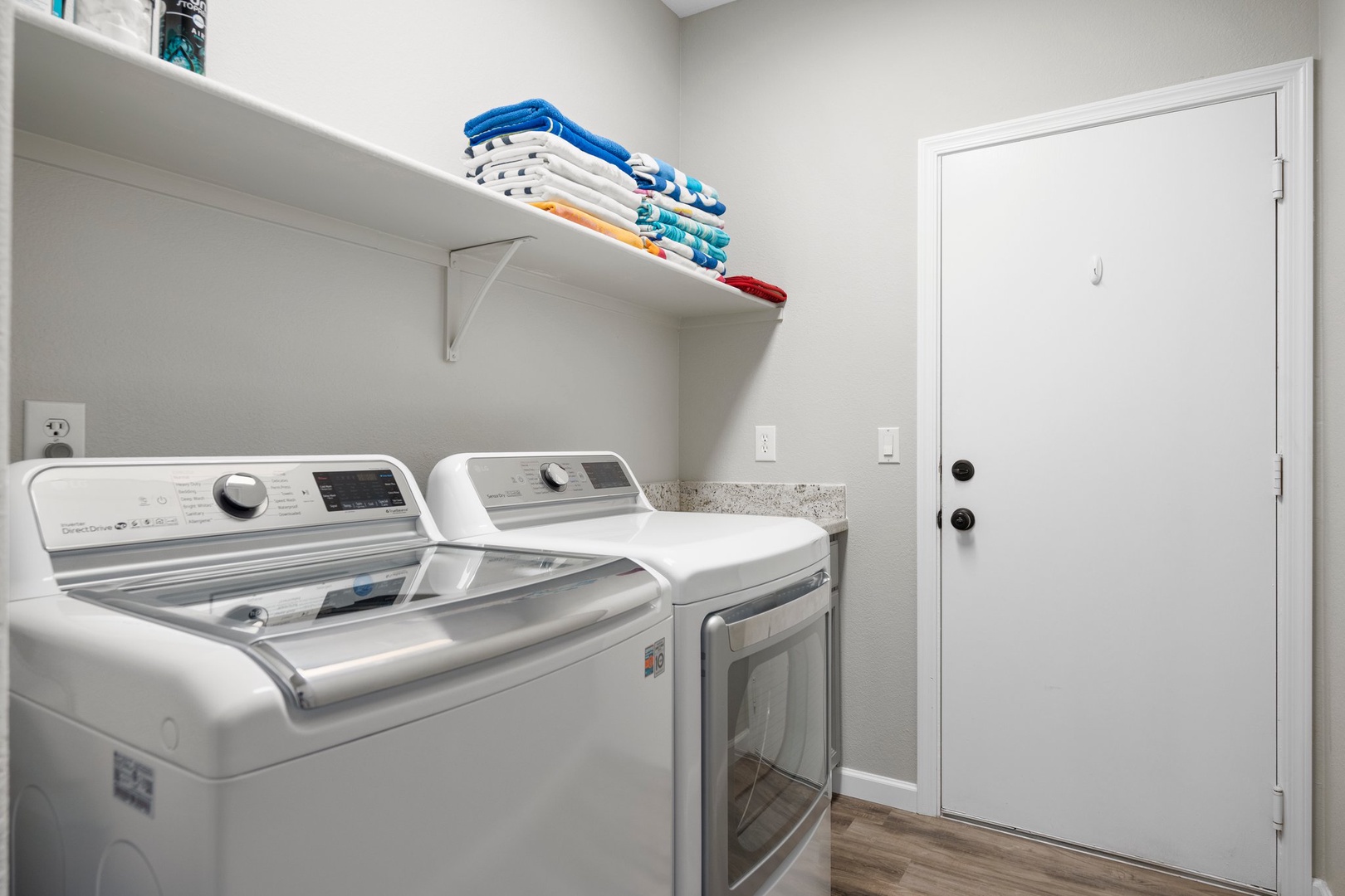 Dedicated laundry room makes it easy to freshen up your wardrobe during your stay, with a full-size washer and dryer plus handy storage for beach towels and linens.