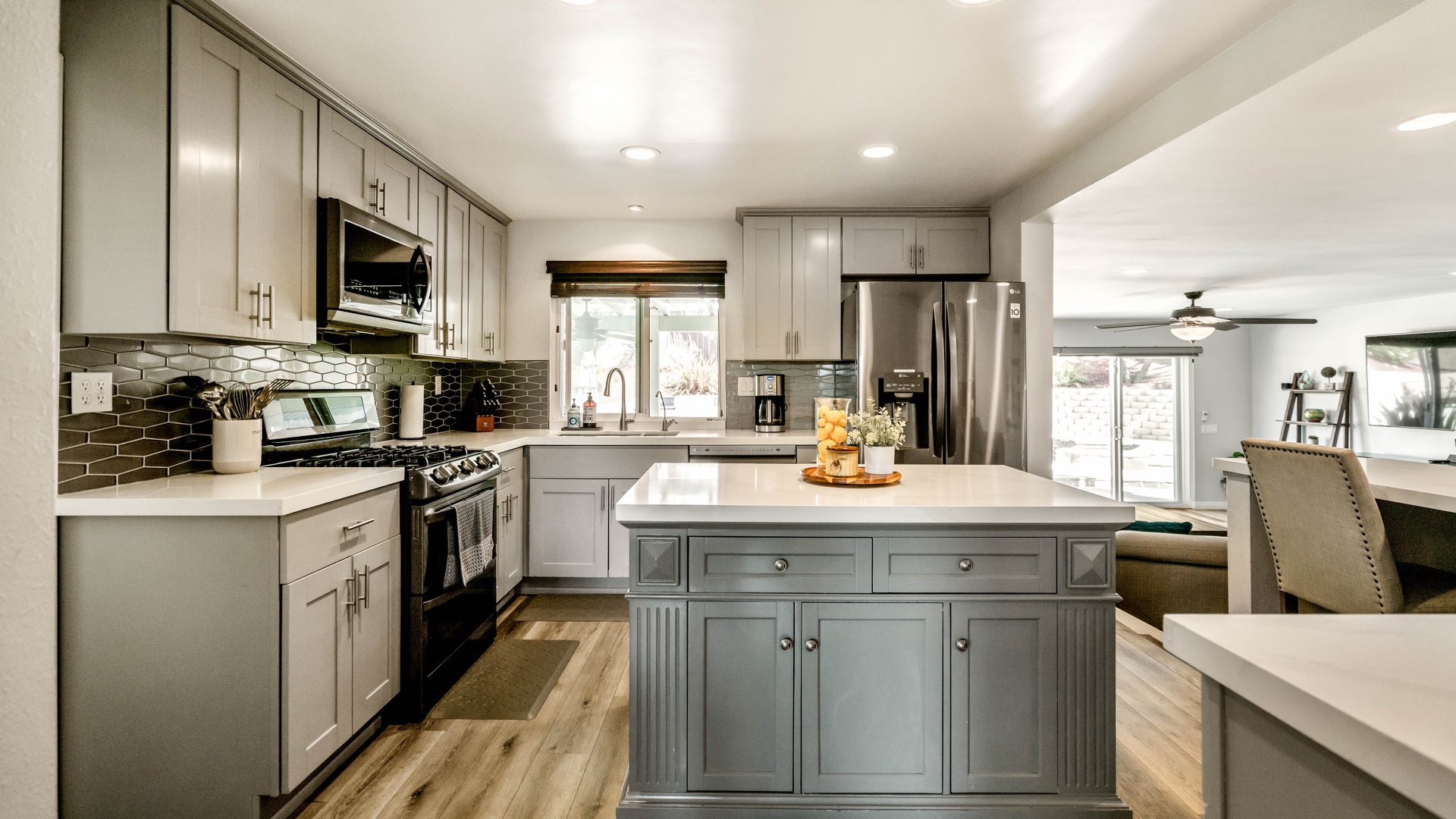 Cook up a storm in the custom kitchen equipped with stainless steel appliances and all the essentials. Help yourself to salt, pepper, and olive oil.