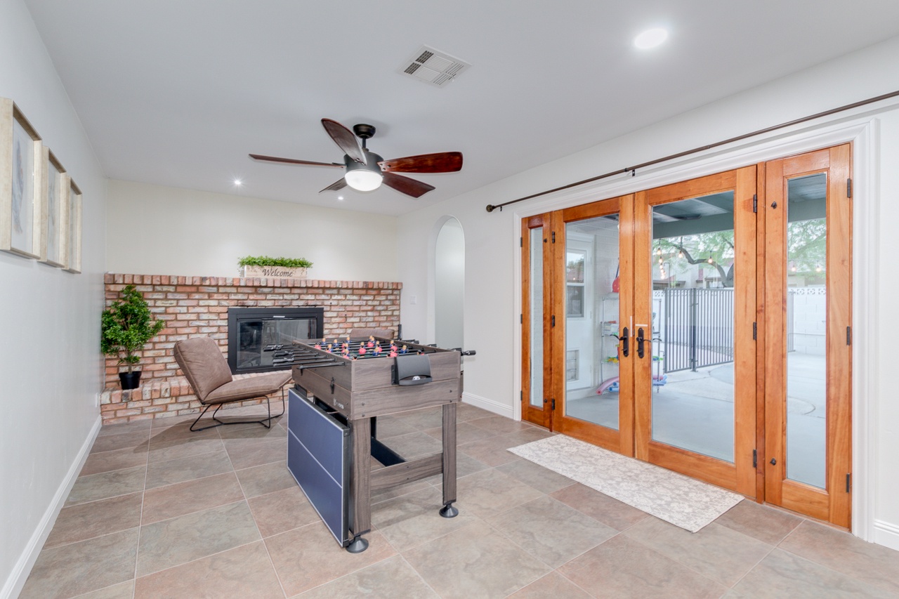 Game Room with 4 in 1 game table and fireplace