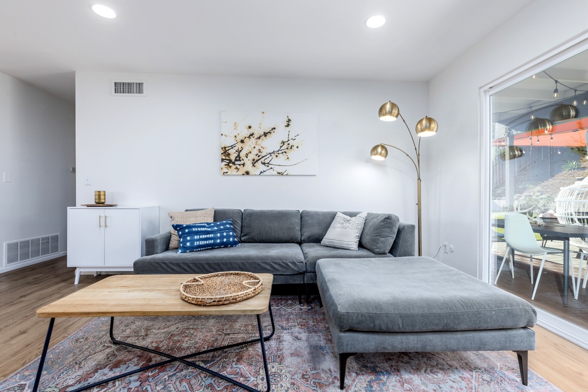 Bright spacious living room with a fireplace