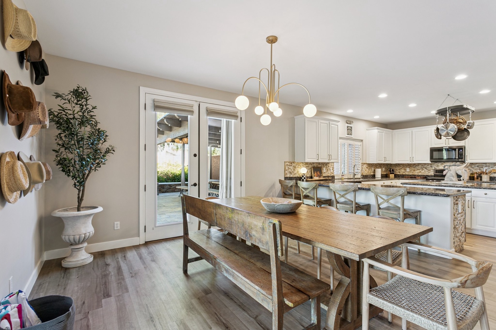 Gather around this beautiful dining space where rustic charm meets modern elegance, perfect for memorable meals together.