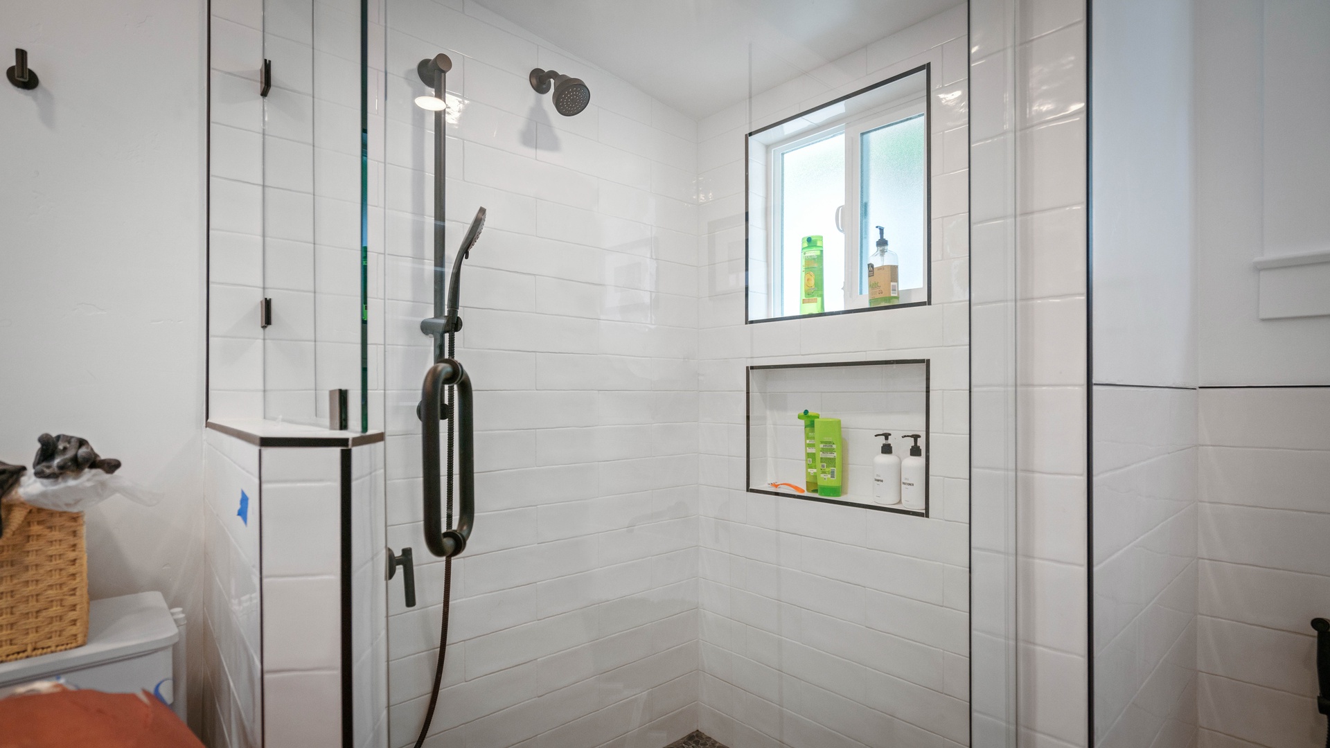 Primary ensuite bathroom with walk in shower, soaking tub and dual vanities