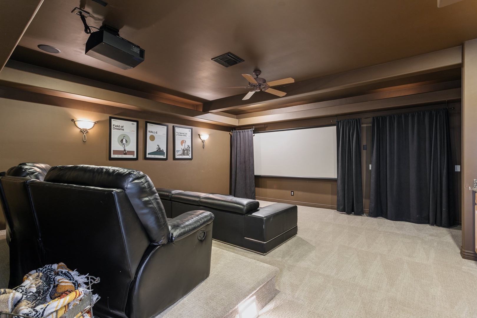 Sink into plush leather recliners for your own private movie theater experience with projector and surround sound.