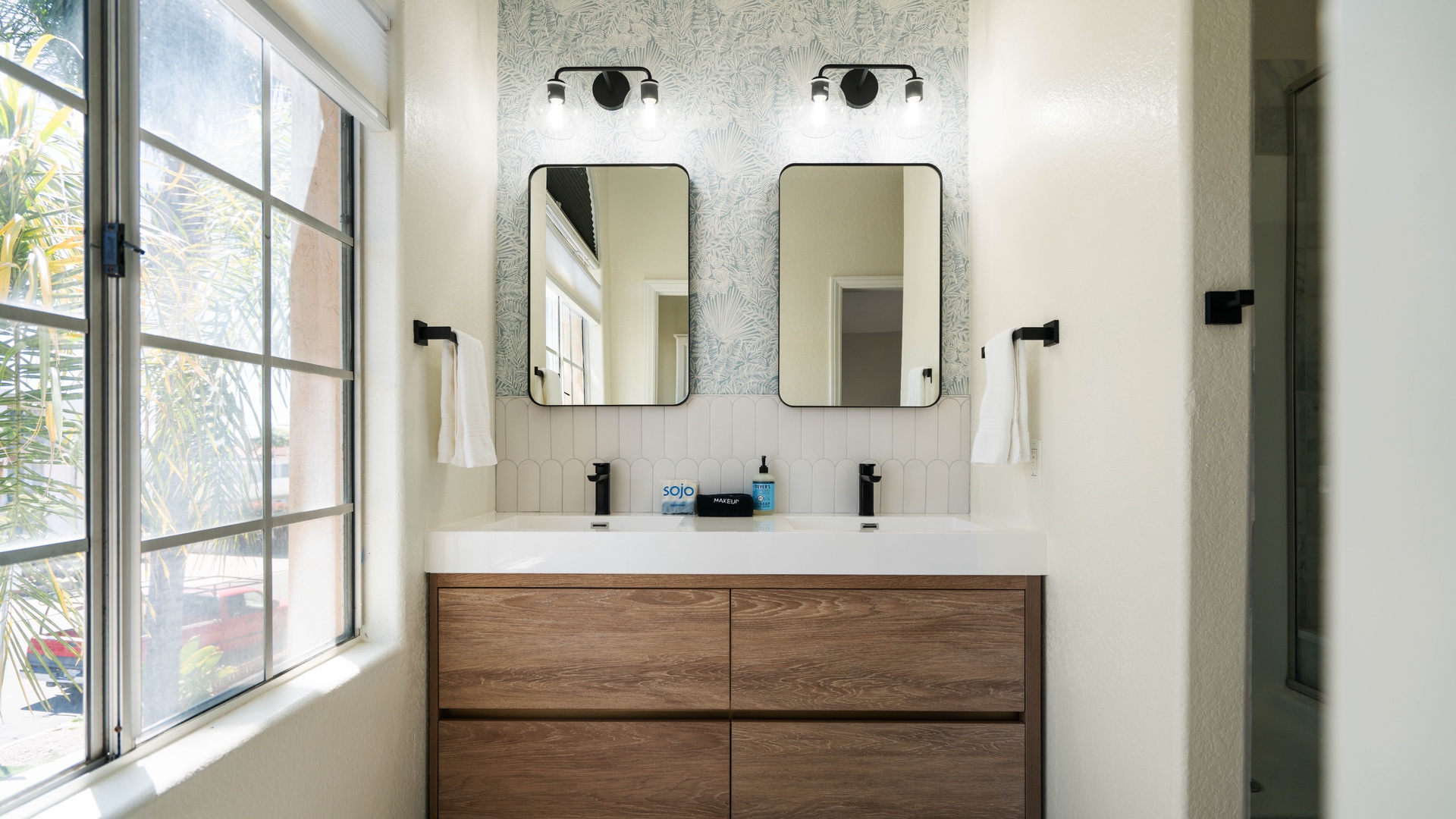 Primary Bedroom ensuite bathroom featuring a walk-in shower and soaking tub with see through fireplace