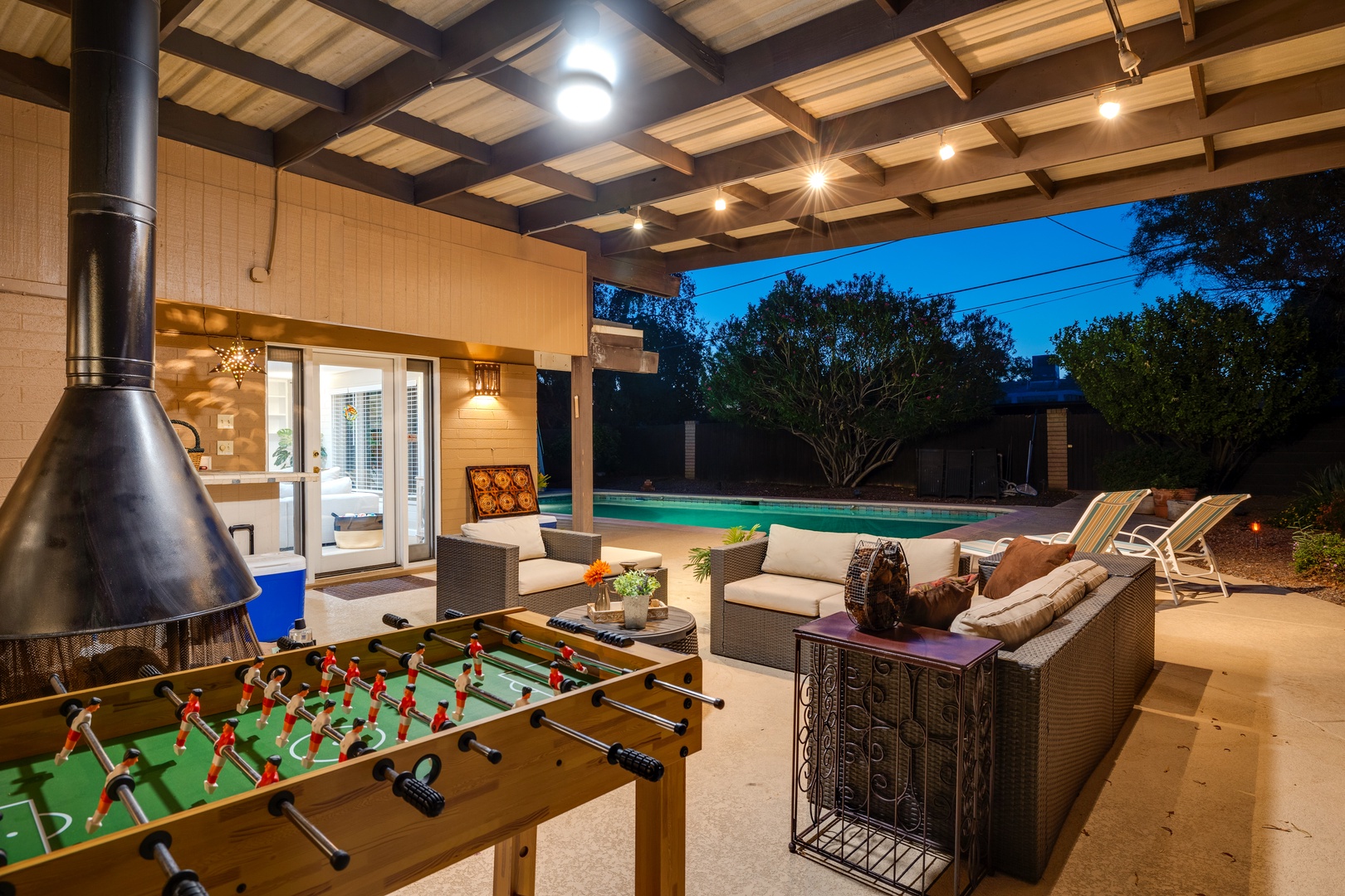 Foosball Table and outdoor lounge area