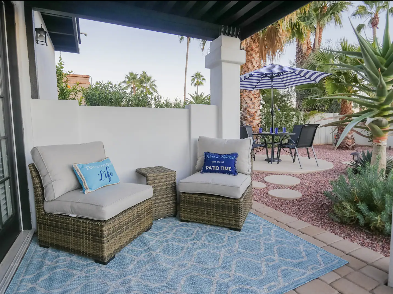 Master Bedroom patio with adjacent pool side dining area.