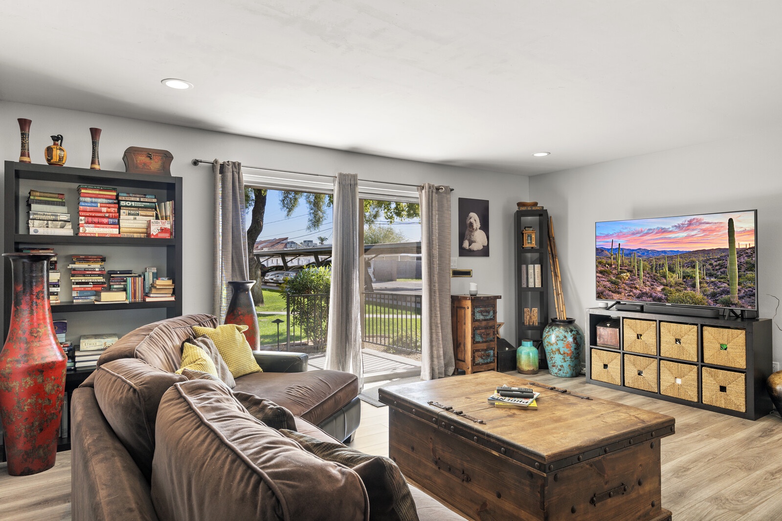 Flat screen tv with streaming services and views to the outside.