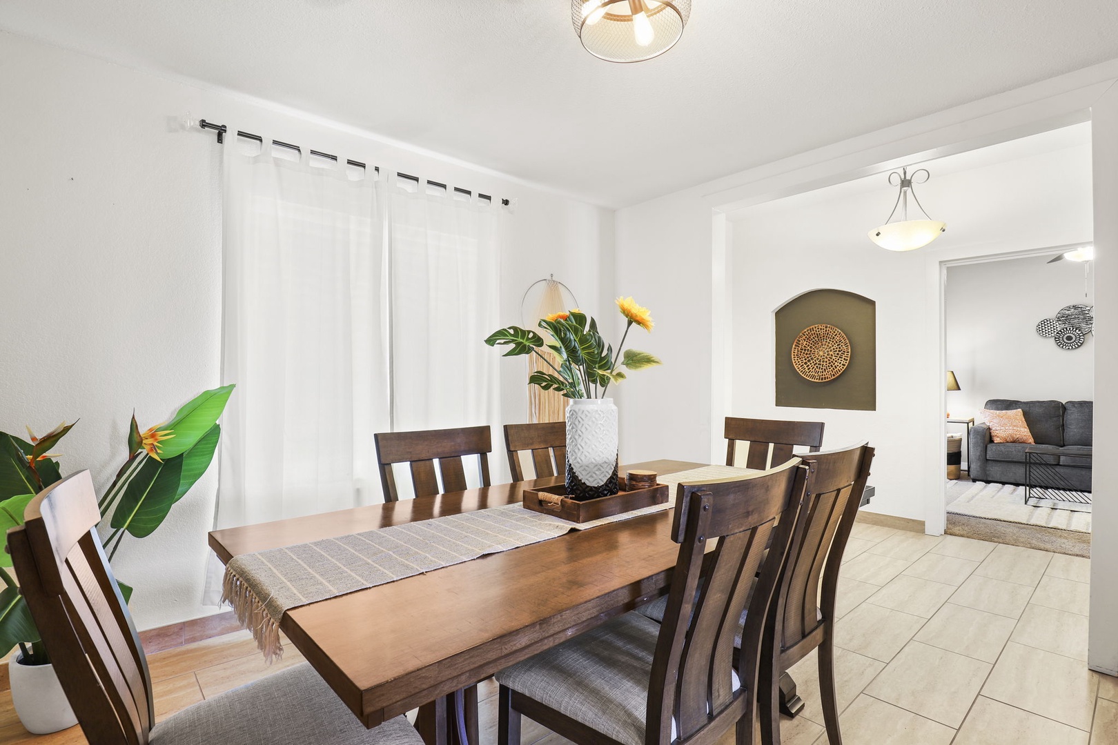 Bright modern dining room with seating for 8