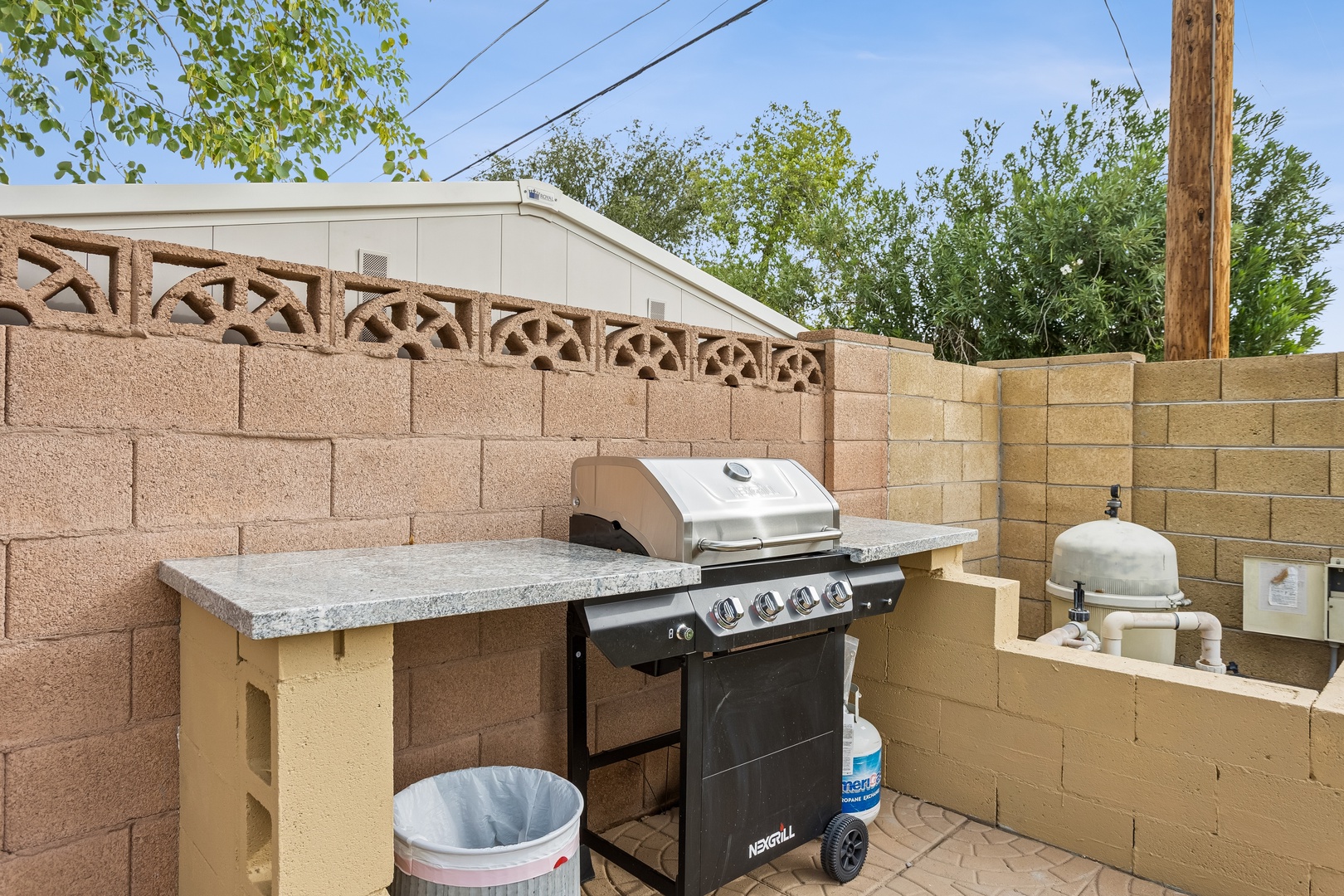 Fire up the grill in your private outdoor cooking area, complete with granite countertops and plenty of prep space for memorable meals under the open sky.