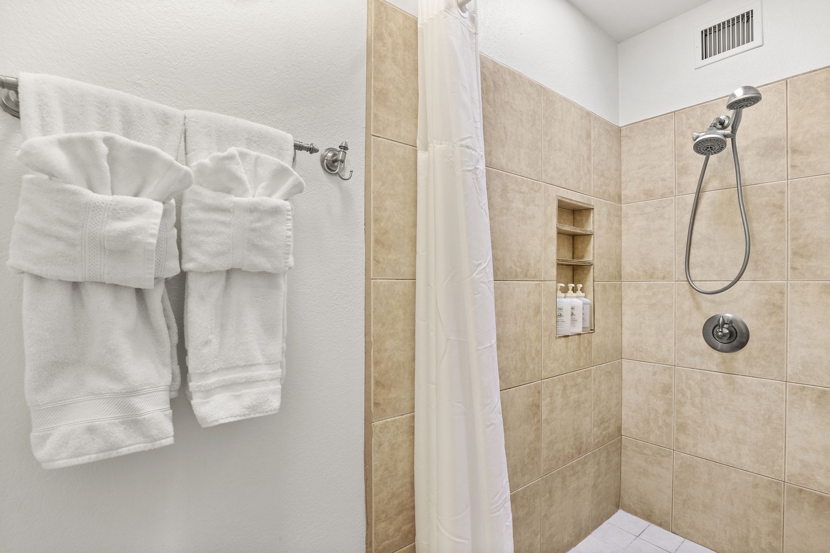 Spacious Master Bath Shower with complimentary body wash, shampoo, conditioner.