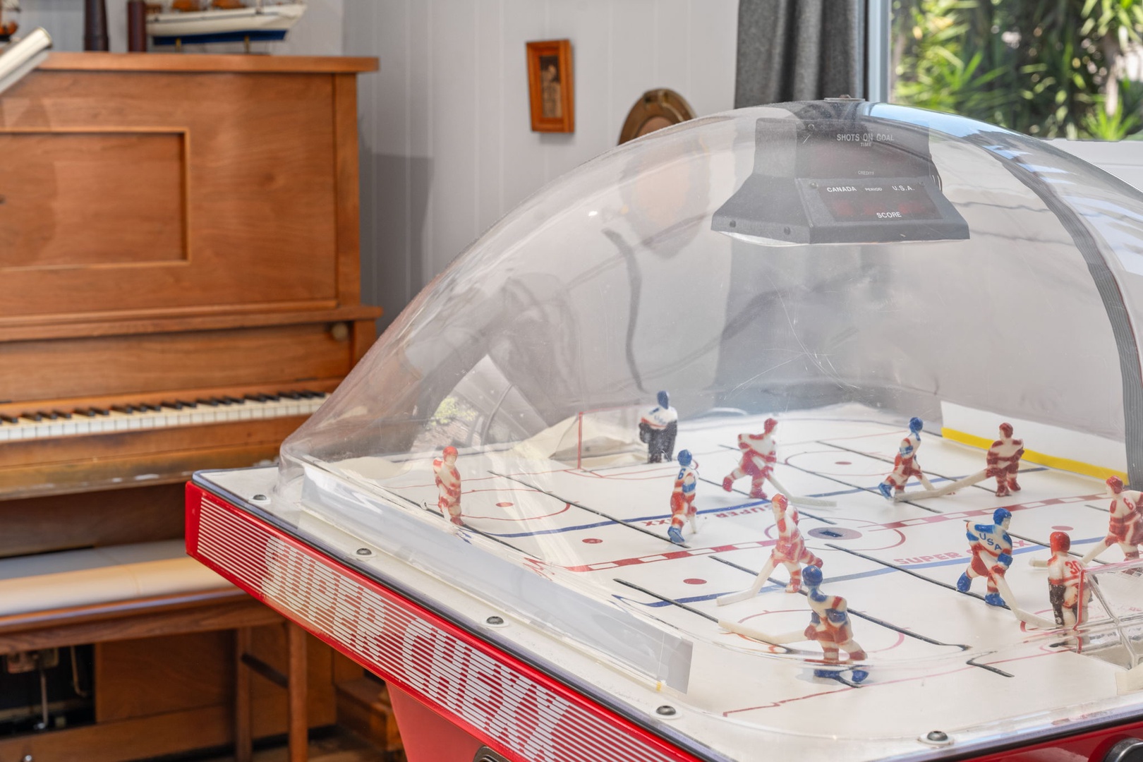 Challenge friends and family to a classic tabletop hockey game in your cozy living space, steps from the piano for post-match tunes.