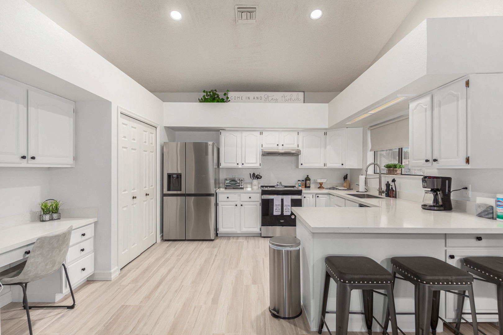 Bright open kitchen fully equipped with all the cooking essentials