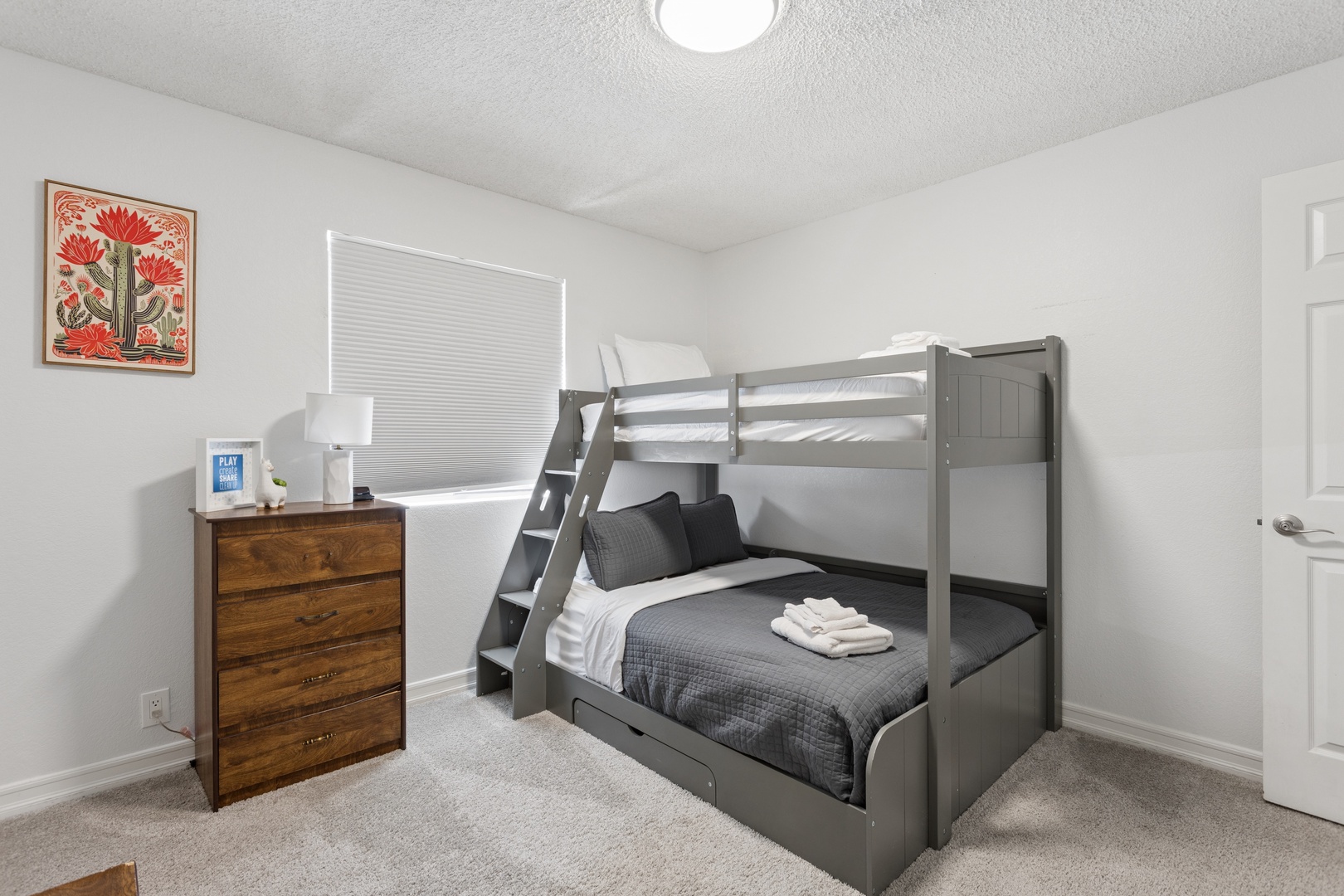 Bedroom 4: One bunk bed (top single, bottom full) + Rollaway bed