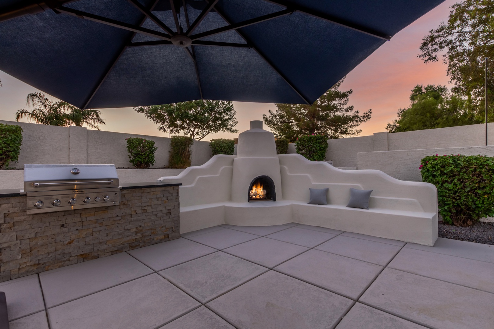 Outdoor fireplace with built in grill