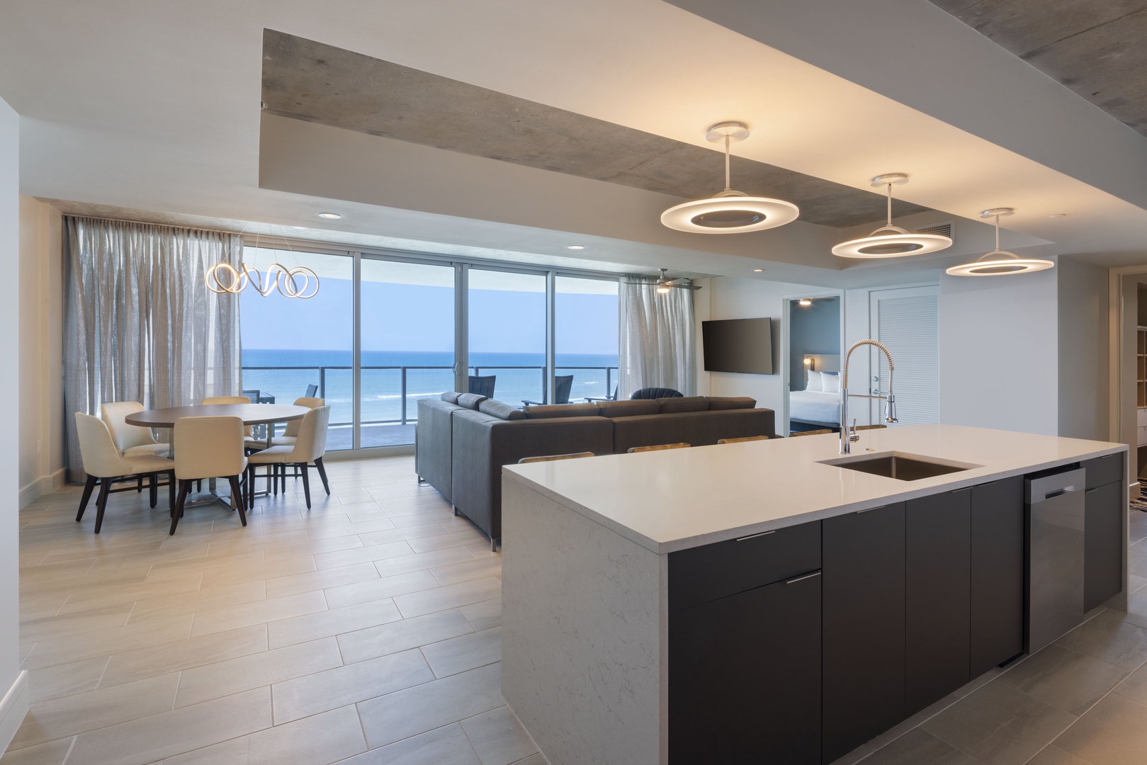 Ocean Breezes and Comfort: Open Concept Living Room Designed for Serenity