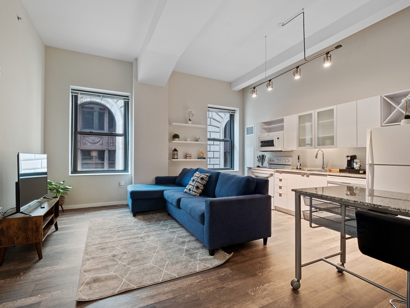 Enjoy the natural light and modern décor in this bright living room