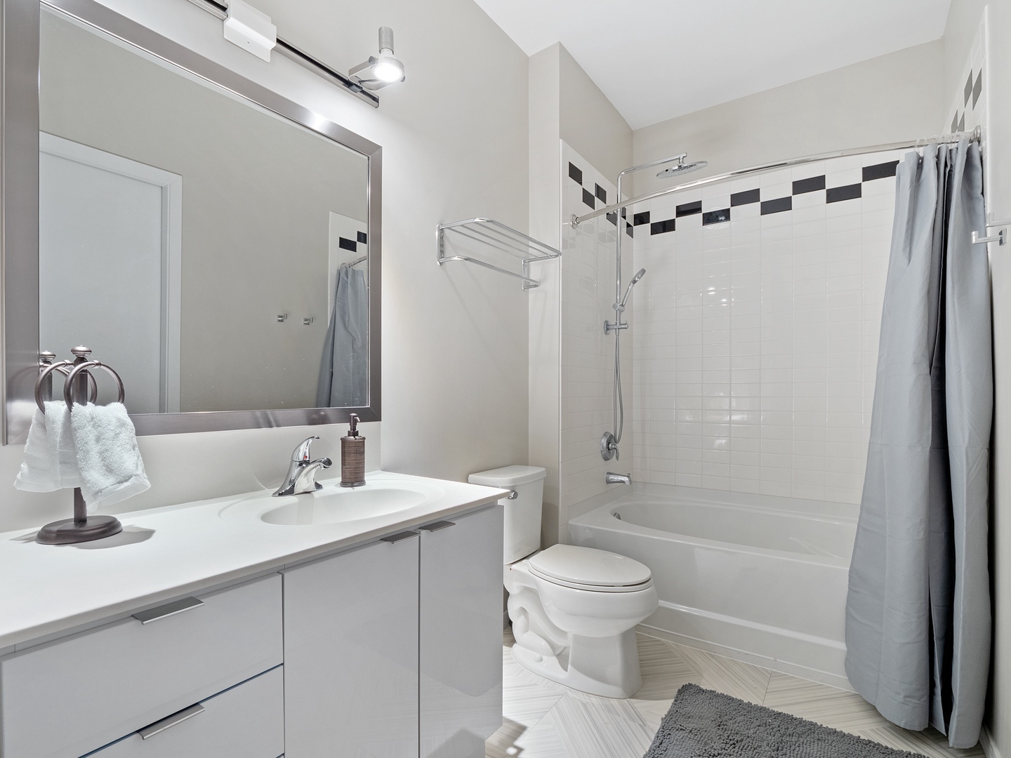 Unwind in this beautifully designed and tranquil bathroom retreat