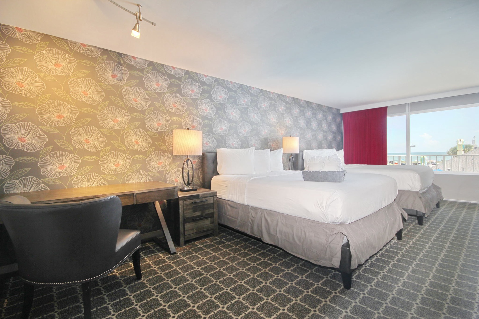 Double queen room with stylish decor