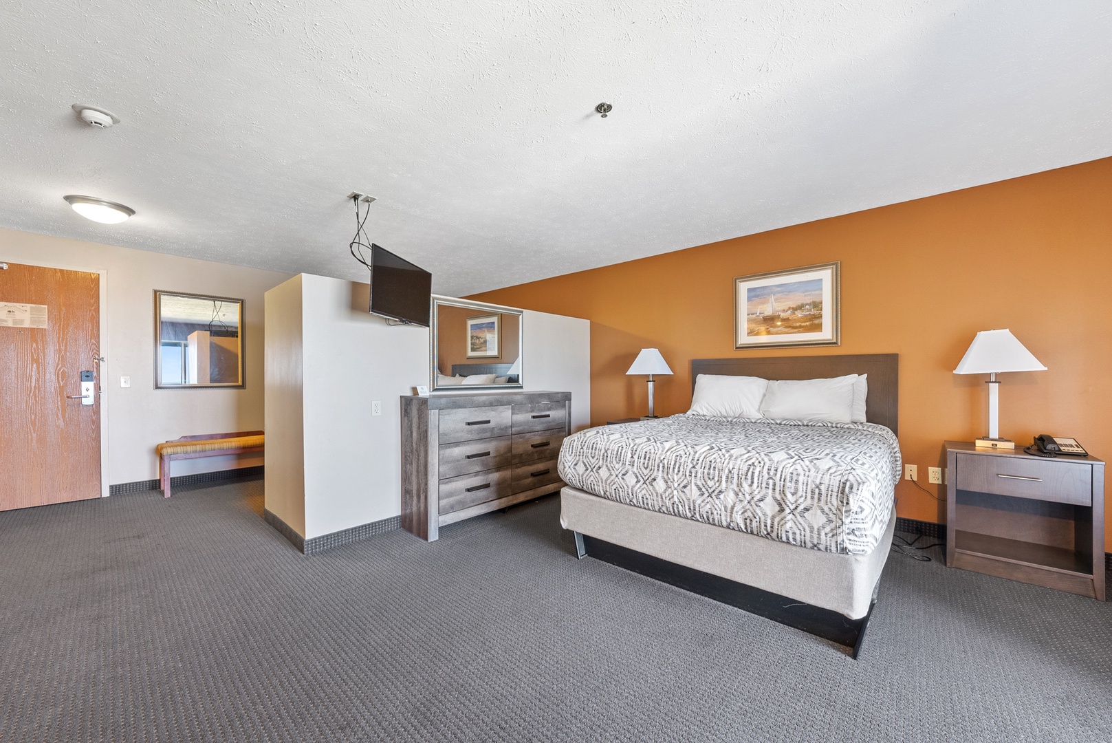 Experience Luxury and Comfort in Our Spacious Suite with Room Divider