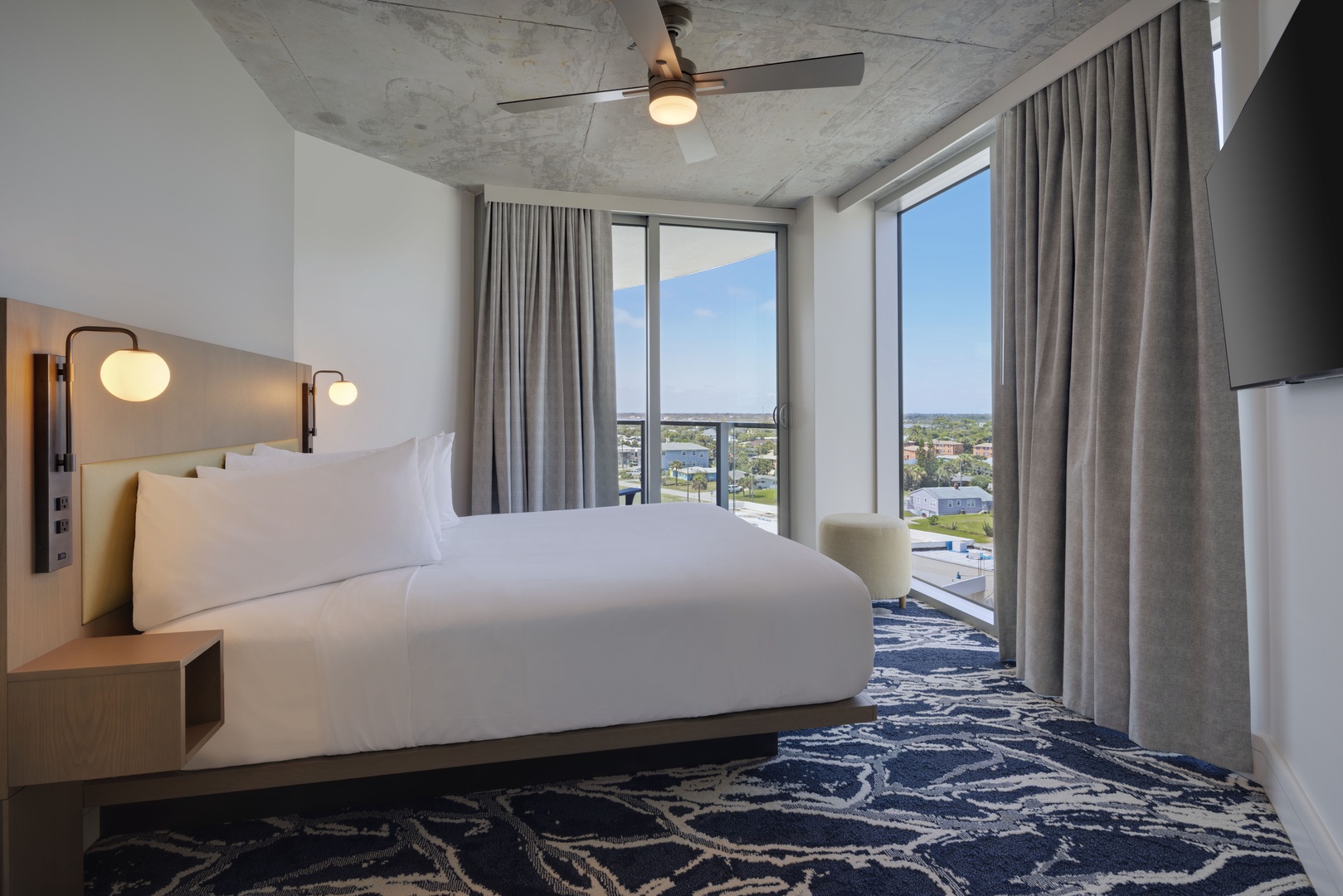 Queen Bedroom Serenity: Where Comfort Meets Cityscape Views