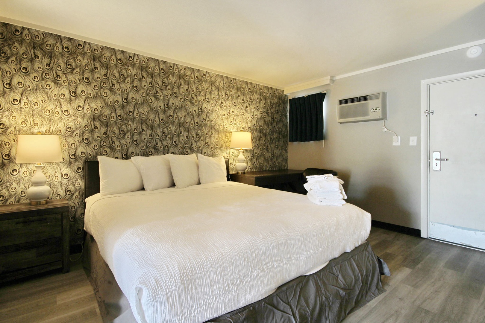 Peaceful bedroom equipped with a comfortable king bed