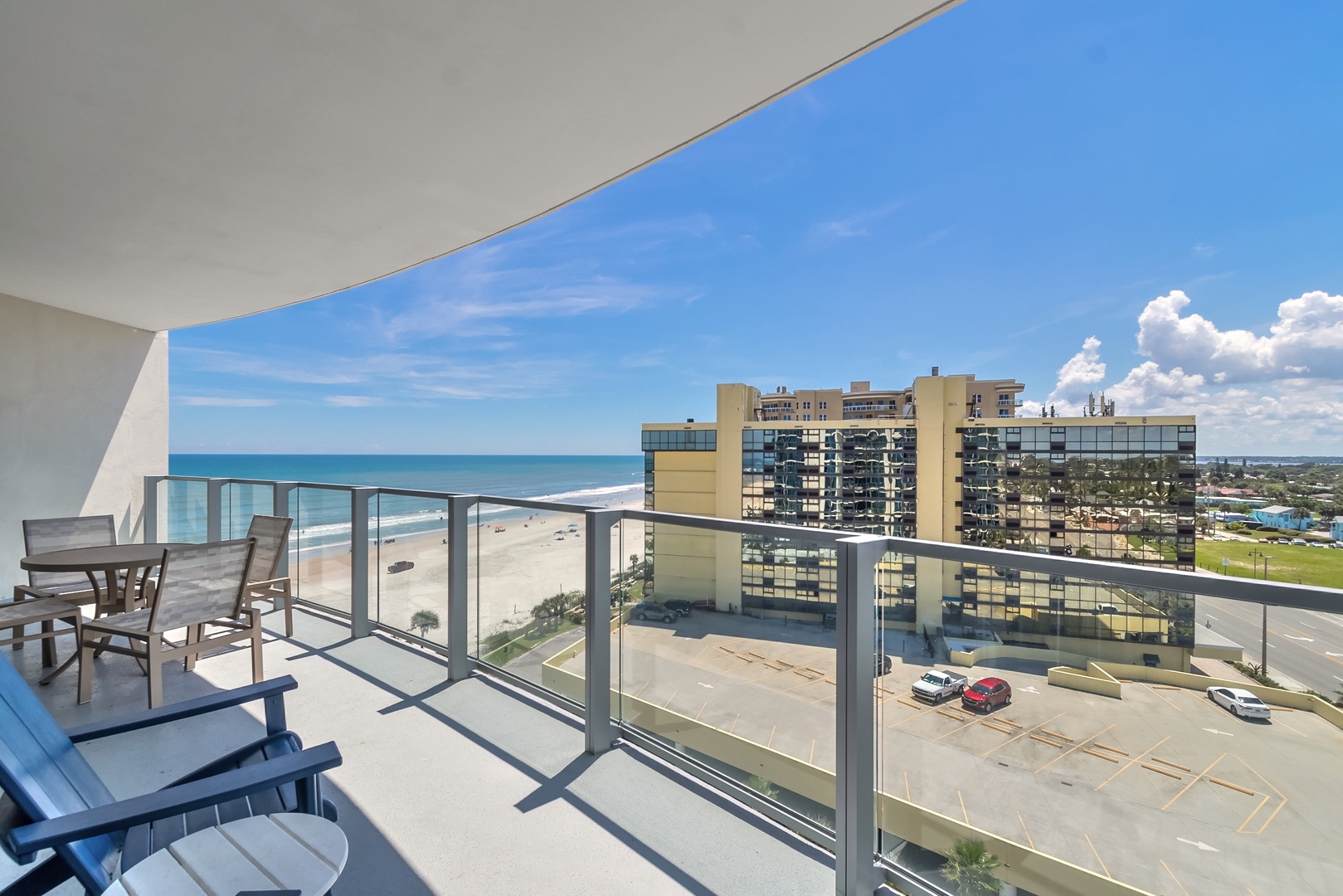 Seaside Tranquility: Your Private Balcony Retreat with Ocean and City Views