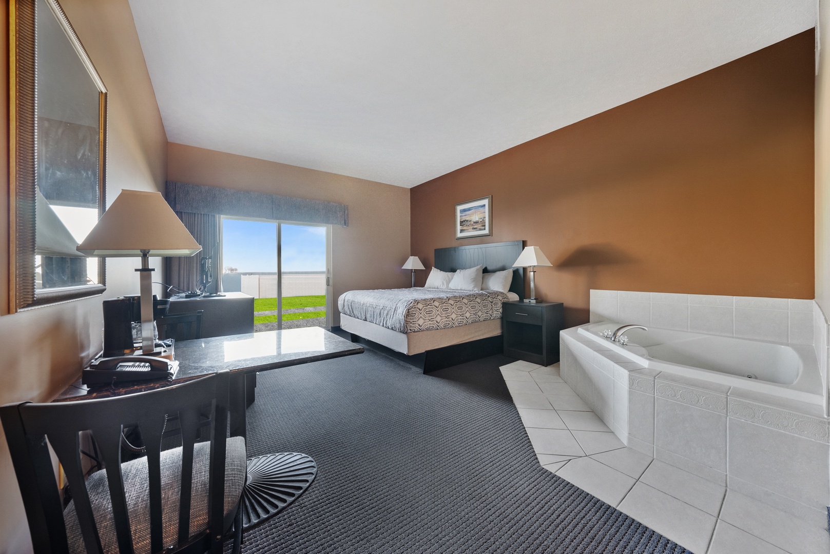 Relax in the luxurious king room with in-room Jacuzzi at Bayshore Resort