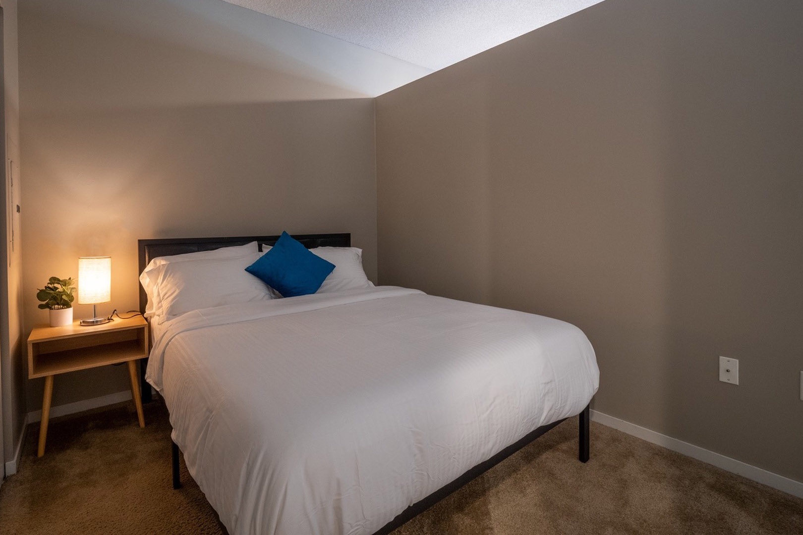 Restful Serenity: Unwind in the Comfort of this Cozy Bedroom