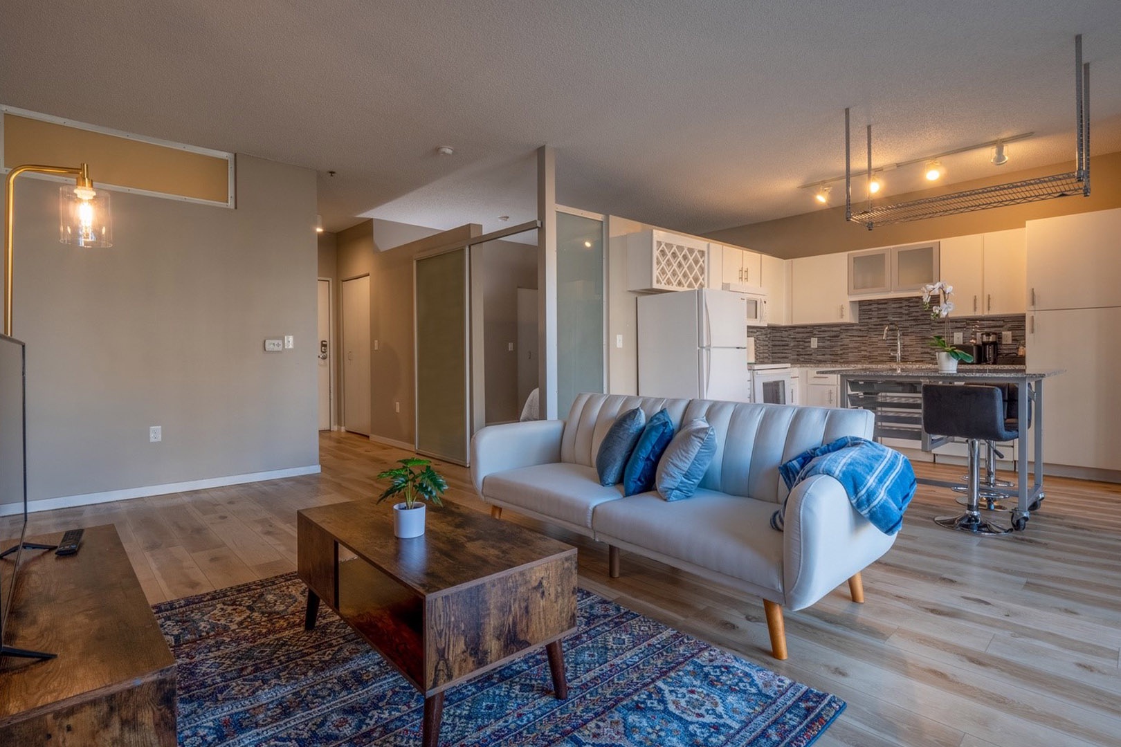Relaxation Redefined: Unwind in the Spacious Living Room of Your City Club Retreat