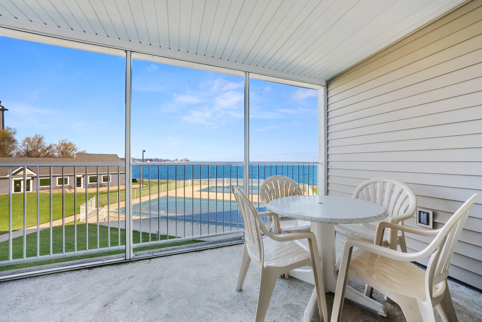 Find peace and relaxation with a picturesque lake view balcony