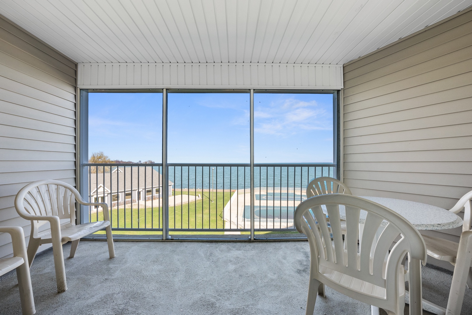 Escape to a serene lakefront retreat with a private balcony