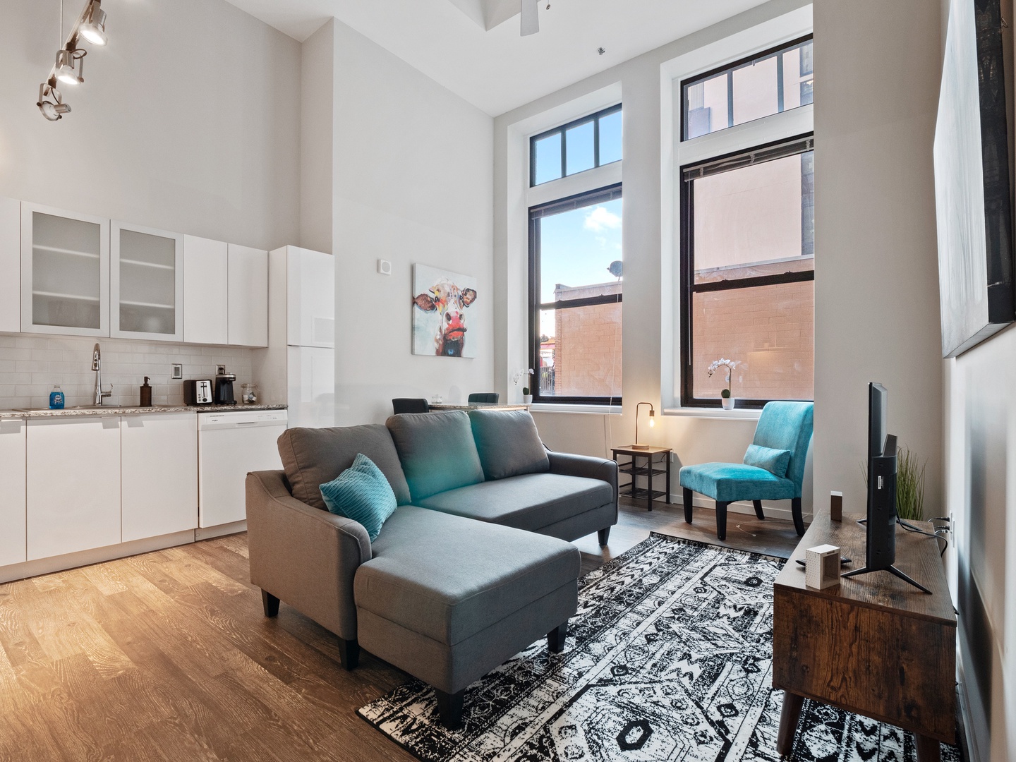 Enjoy the natural light and modern décor in this bright living room