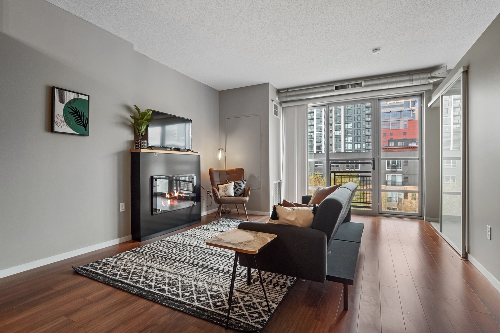 Elevate Your Stay: Make Memories in the Spacious Living Room of Your City Club Condo