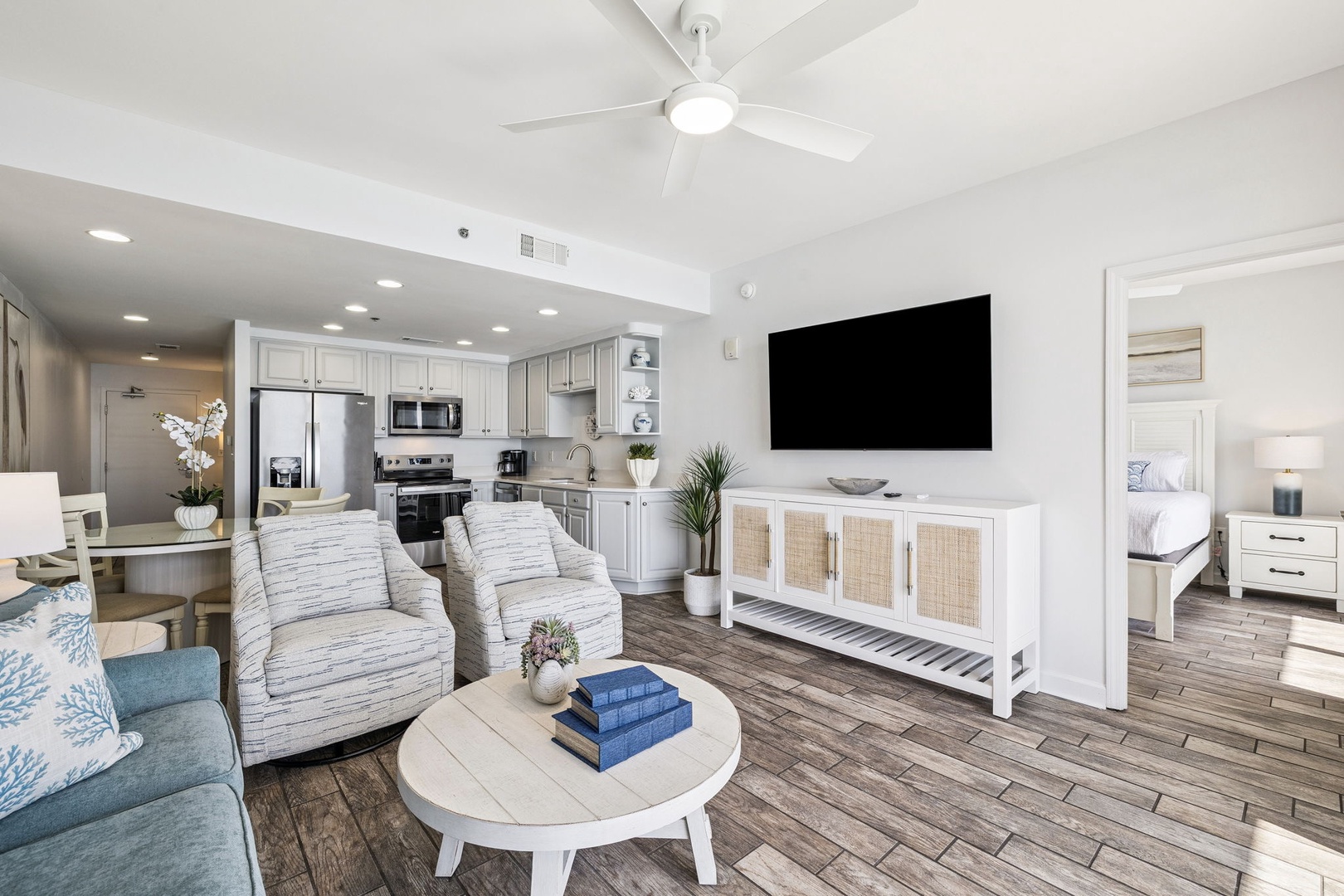 Step into your bright, open living space where coastal charm meets modern comfort—perfect for relaxing after beachside adventures.