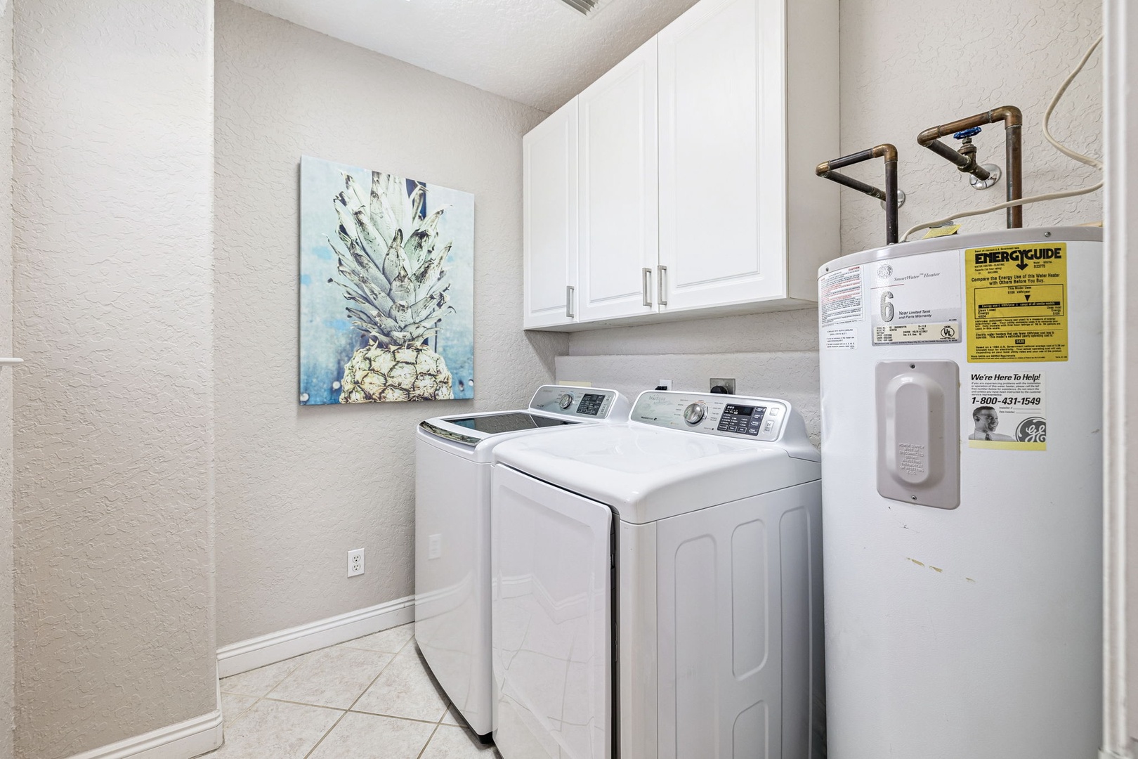Keep your clothes fresh in this well-equipped laundry room with full-size washer, dryer, and water heater.