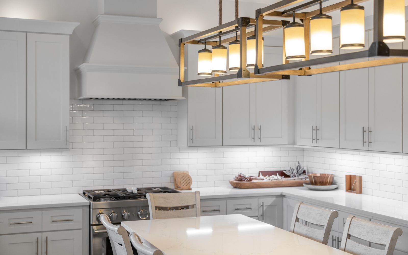 Your fully equipped kitchen awaits with modern appliances, warm lighting, and ample counter space for cooking memorable meals.