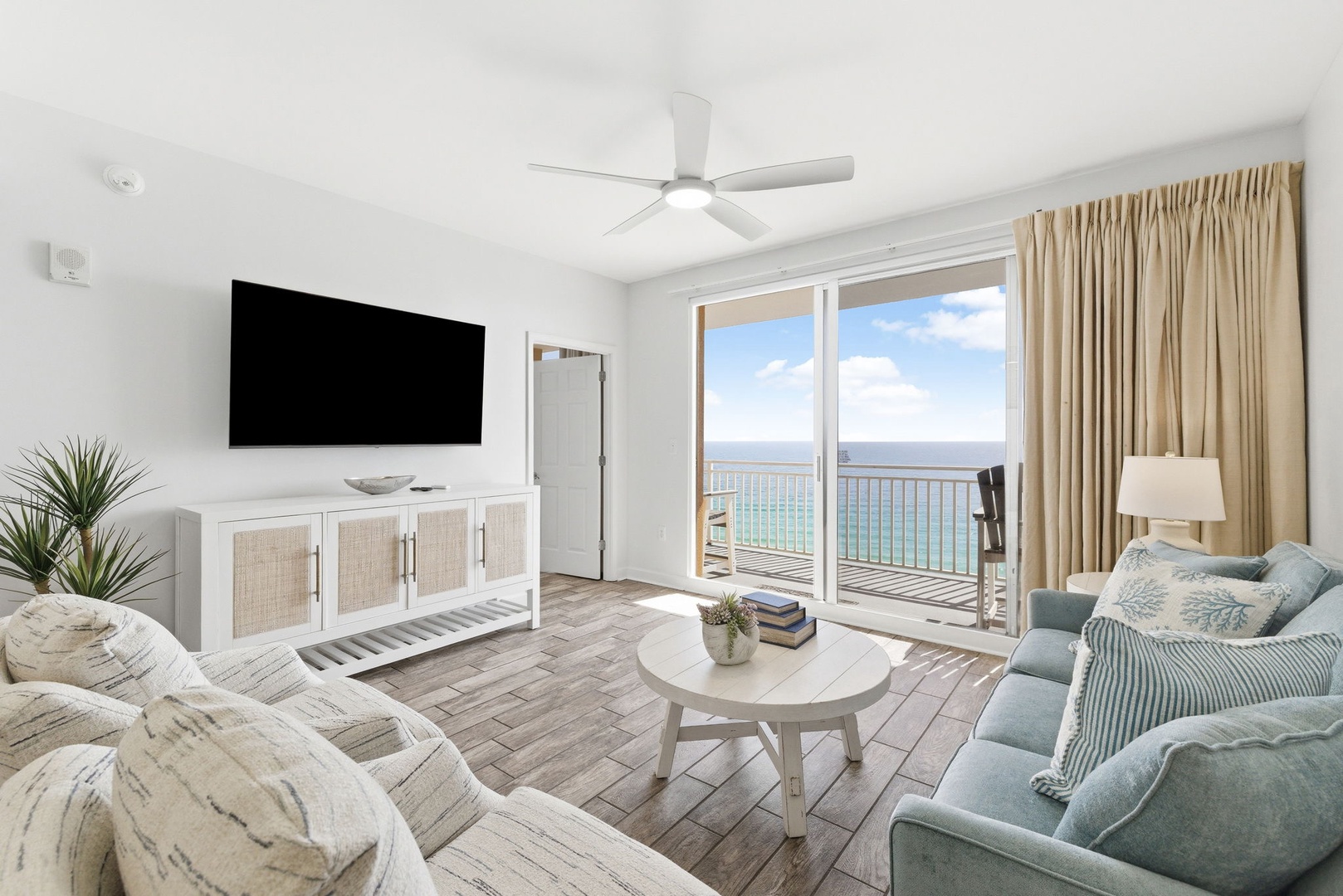 Unwind in your bright living space where ocean breezes flow through to your private balcony with stunning sea views.