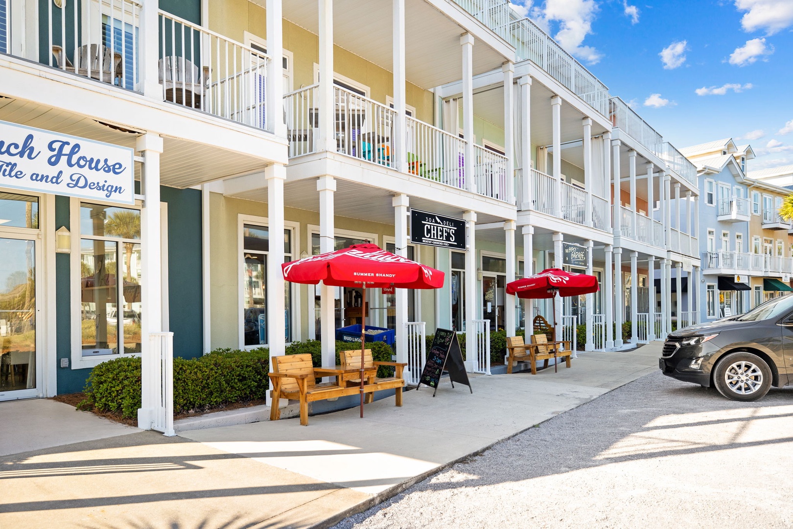 Charming beachside shops and restaurants line this coastal street, perfect for leisurely strolls during your stay.